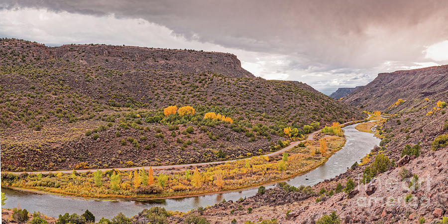 Stormy Skies Over the Rio Grande Del Norte at Orilla Verde - Taos County New Mexico Photograph by Silvio Ligutti