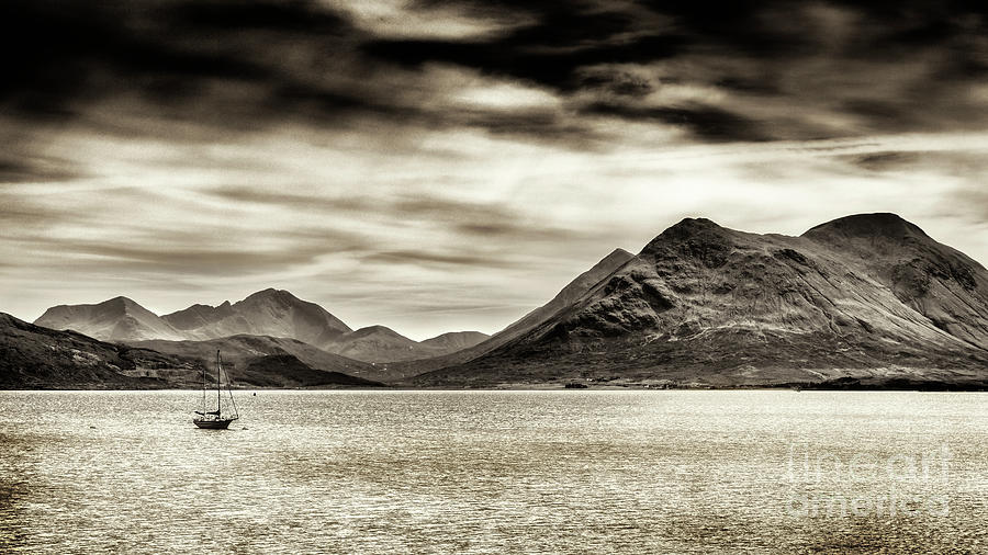 Stormy skies over the The Sound of Raasay and The Isle of Skye Photograph by Phill Thornton