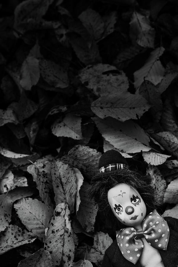 black and white clown doll