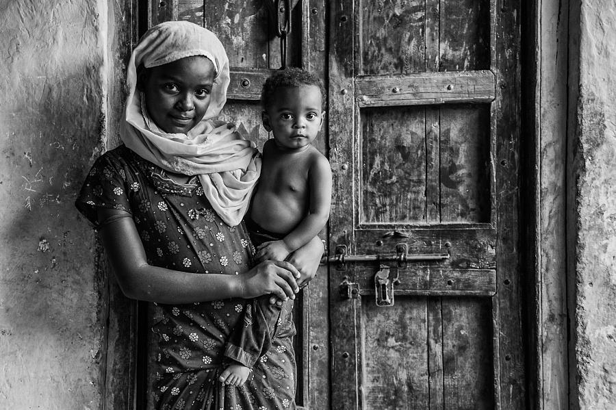 Black And White Photograph - Strangers by Mohammed Alnaser