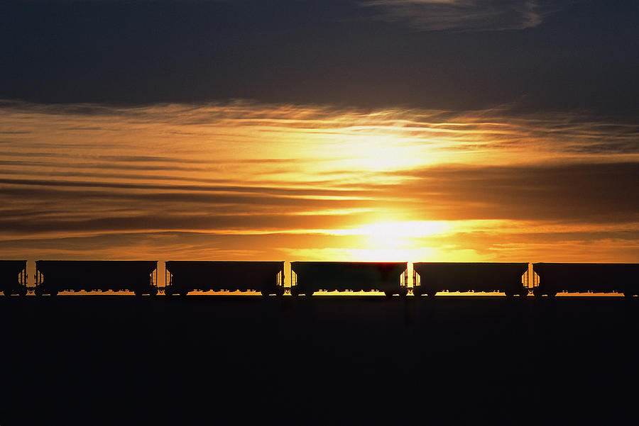 Stratified Sunset With A Unit Train Photograph by Mike Danneman