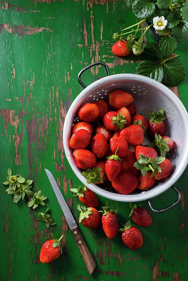 Strawberries In A Colander Photograph by Great Stock!