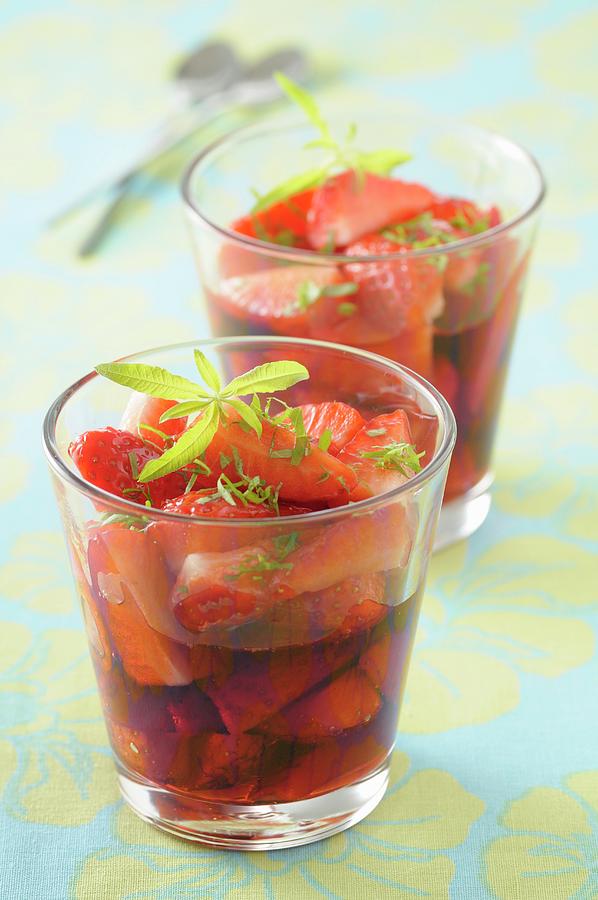 Strawberries In Lemon Verbena Syrup Photograph by Jean-christophe Riou