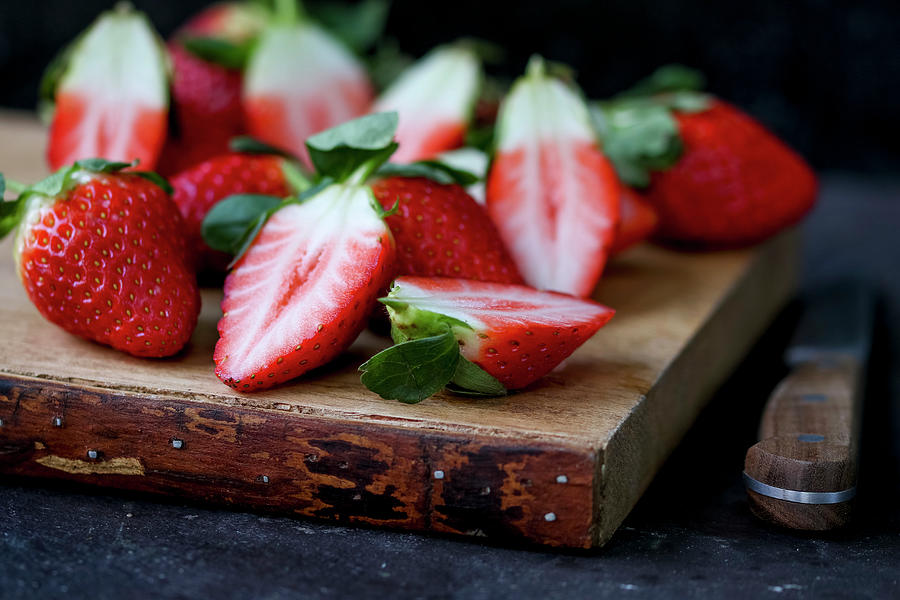 Strawberries On Chopping Board Photograph by Nicky Corbishley