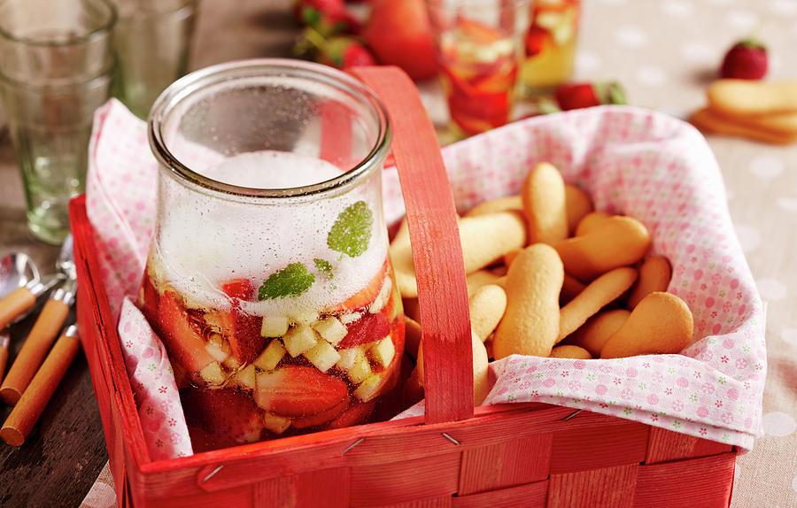 Strawberry And Apple Punch With Cider And Sparkling Wine In A Picnic Basket With Biscuits Photograph by Teubner Foodfoto