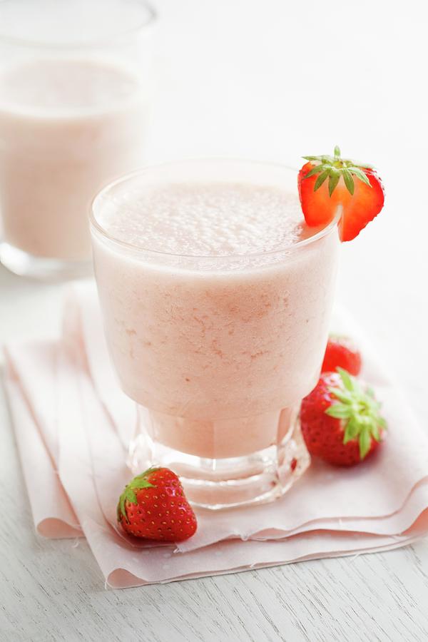 Strawberry And Banana Smoothies Photograph by Victoria Firmston