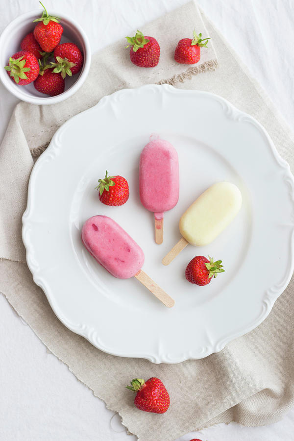 Strawberry And Mango Ice Lollies For Summer Photograph by Tamara Staab