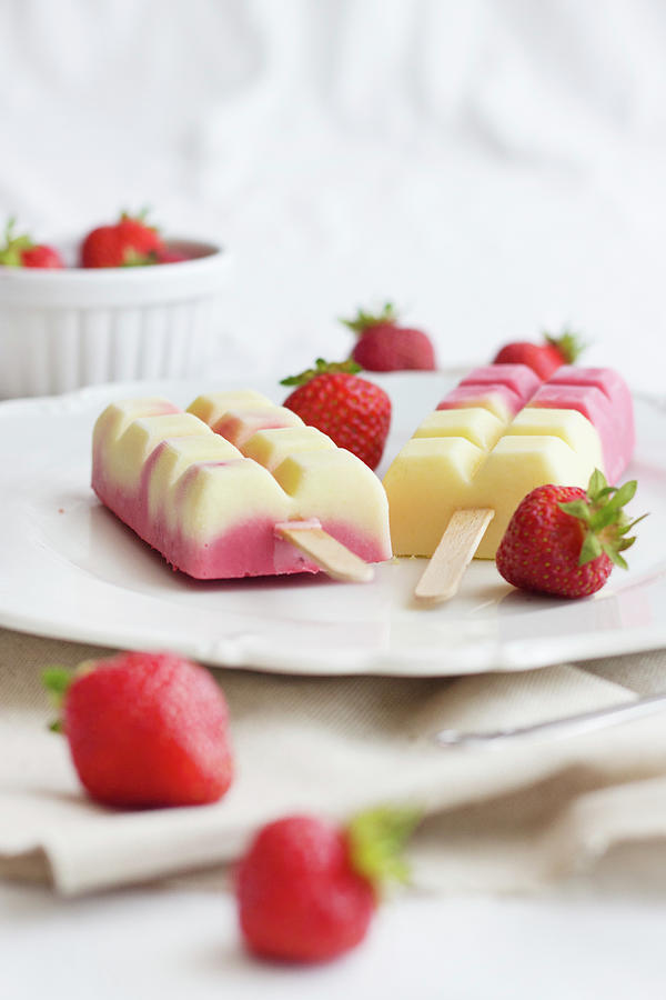 Strawberry And Mango Ice Lollies Photograph by Tamara Staab