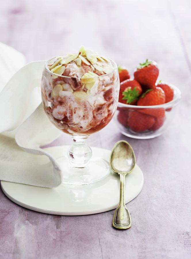 Strawberry And Quark Dessert With Almonds Photograph by Mikkel Adsbl