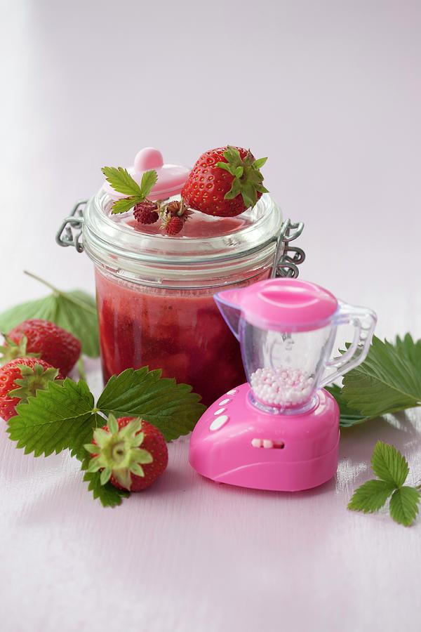 Strawberry And Wild Strawberry Jam In A Preserving Jar Photograph by Martina Schindler