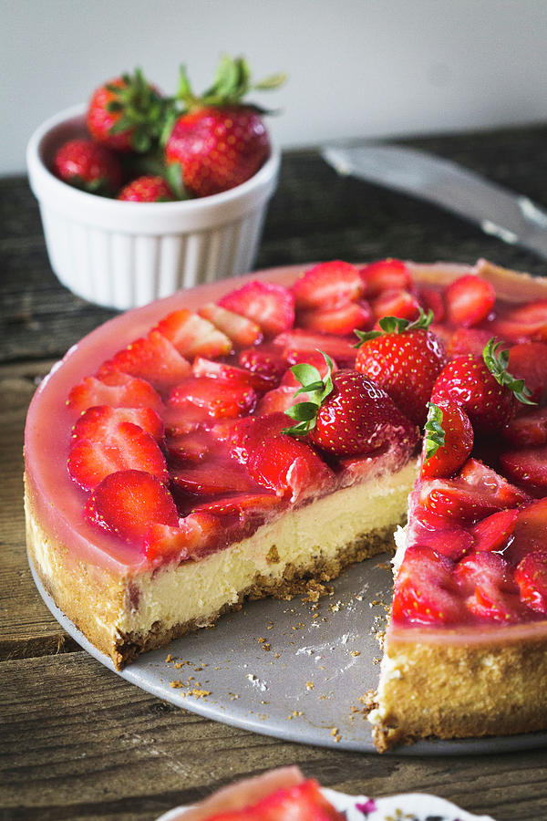 Strawberry Cheesecake With An Almond Base, Sliced Photograph by Antonia Kurz