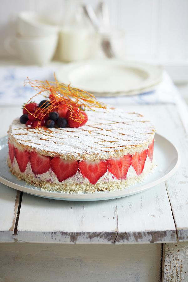 Strawberry Fridge Cake With Mixed Berries And Caramel Threads Photograph by Charlotte Tolhurst