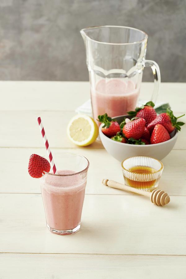 Strawberry Milkshake With Honey Photograph by Julia Hildebrand