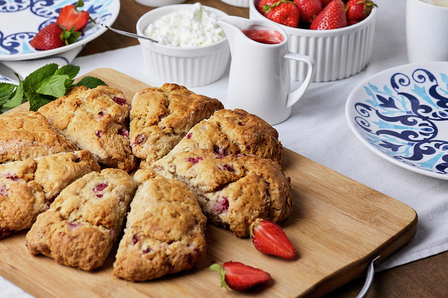 Strawberry Scones Served With Cottage Cheese And Strawberry Sauce Photograph by Natasa Dangubic