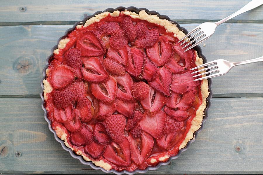 Strawberry Tart In A Baking Tin With Forks seen From Above Photograph by Kate Prihodko