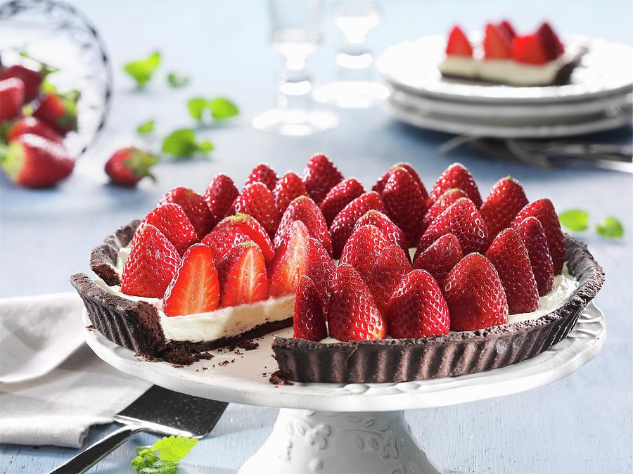 Strawberry Tart, Sliced, On A Cake Stand Photograph by Christian Schuster