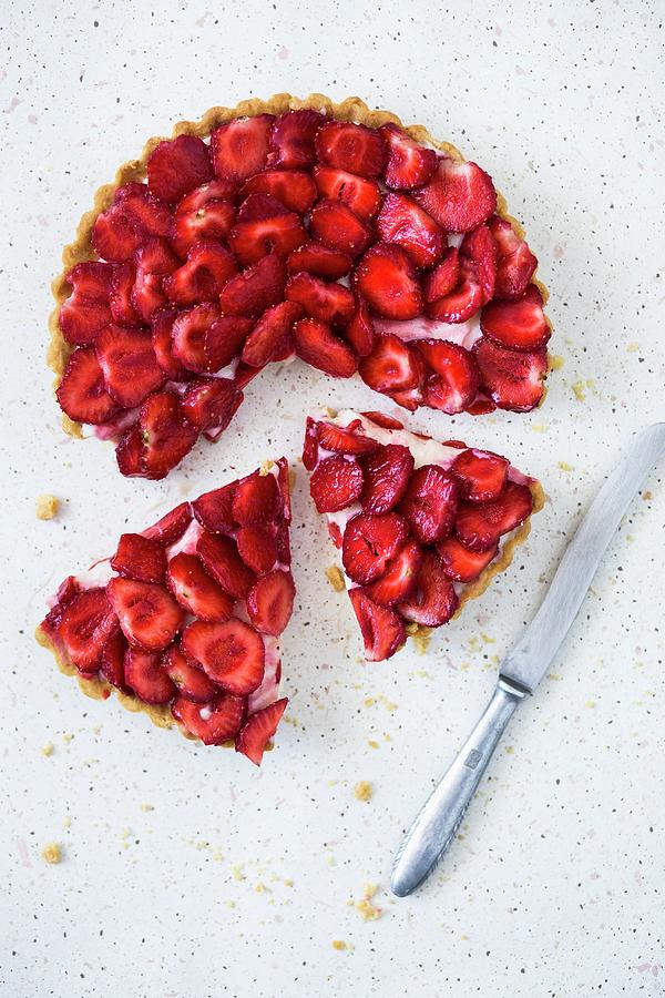 Strawberry Tart With Two Slices Cut Out Photograph by Malgorzata Laniak