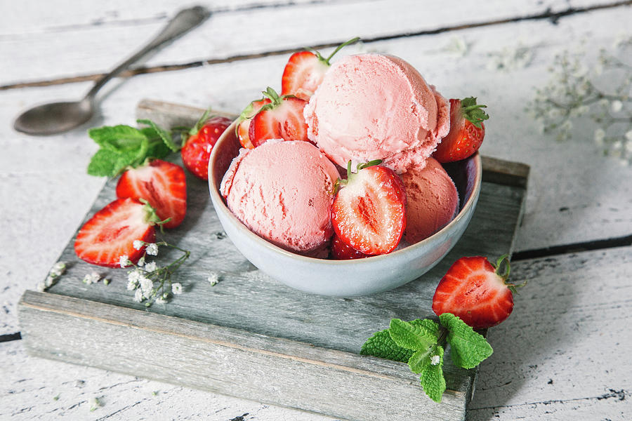 Strawberry Yoghurt Ice Cream With Fresh Strawberries In A Bowl Photograph by Denise Rene Schuster