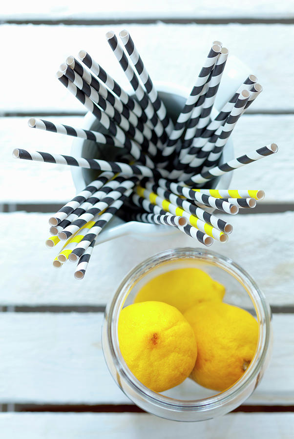 Straws And Lemons As Utensils And Ingredients For Drinks Photograph by Studio Lipov