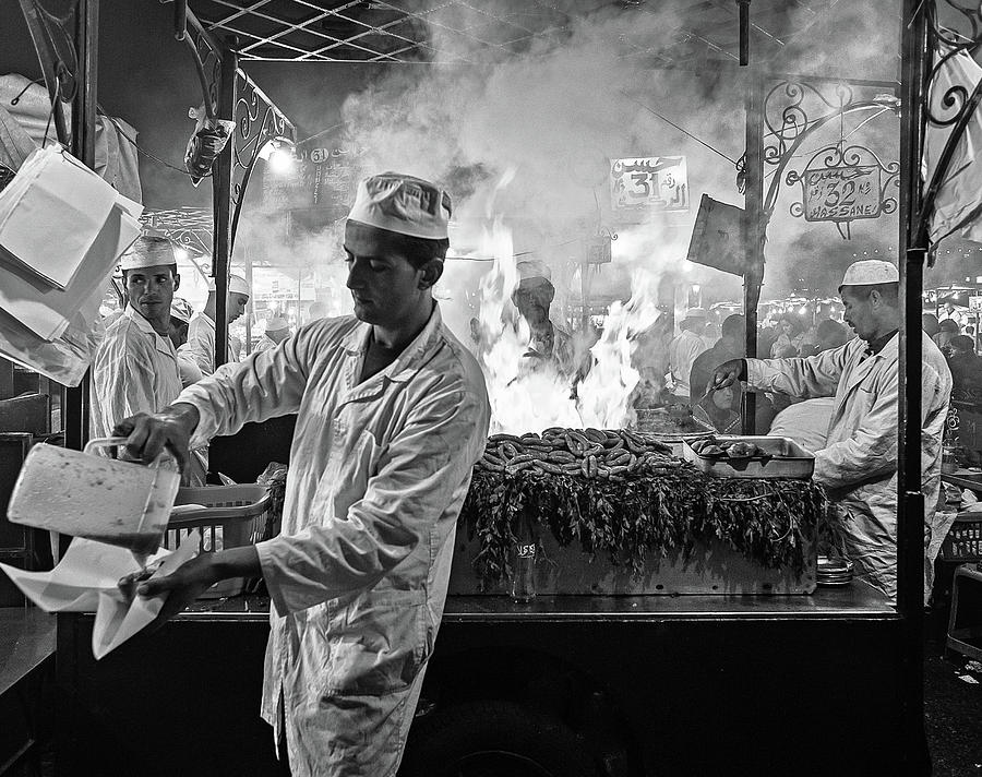 Black And White Photograph - Street Cooking by Rodrigo Marin