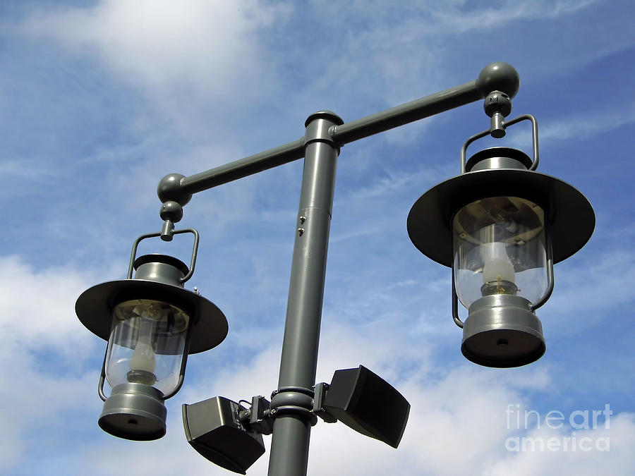 Street Lamps With Blue Sky Photograph by D Hackett