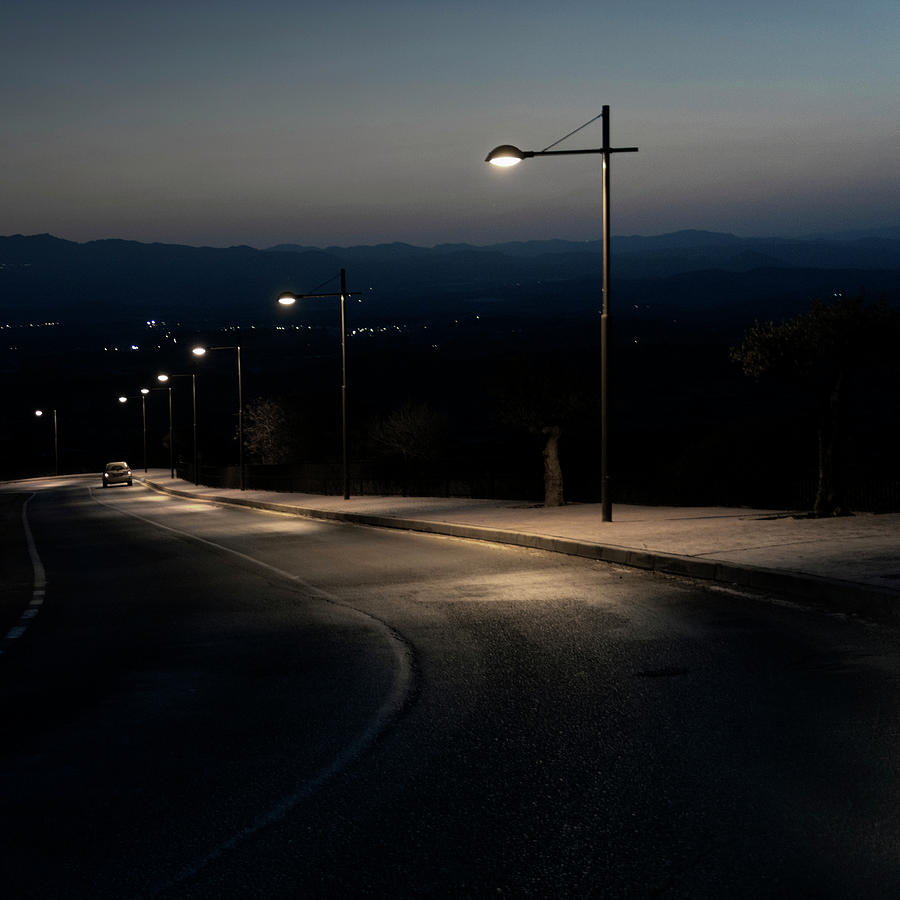 Street Lights On Road Photograph by Julio López Saguar