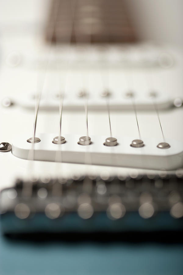 String Vibrations On Electric Guitar Photograph by Stewart Waller