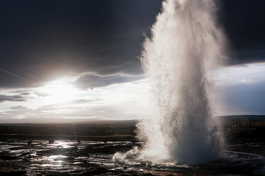 Strokkur Erupting Photograph by Dave Carr