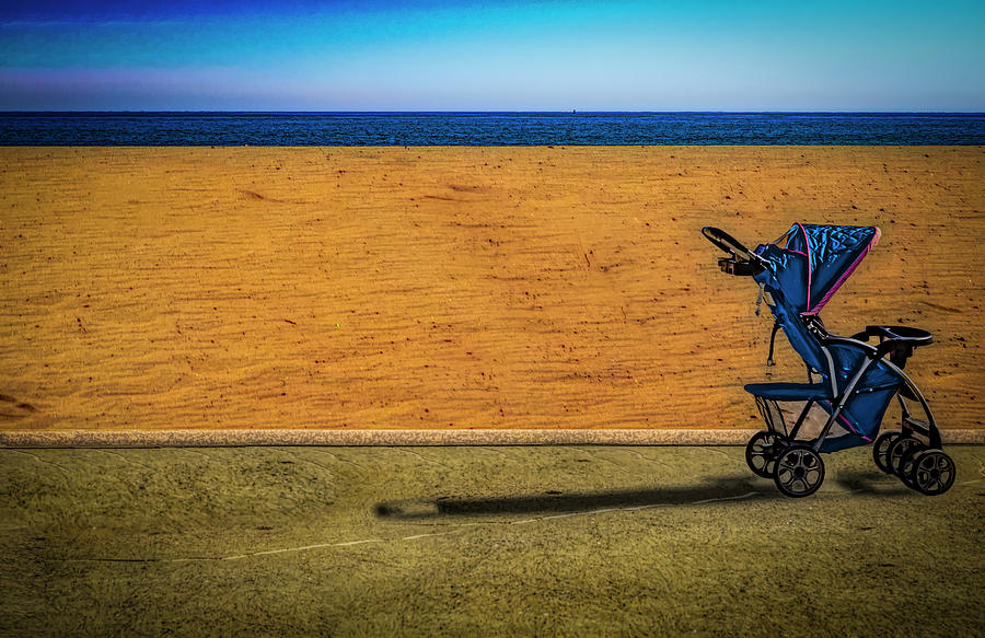 Stroller at The Beach Photograph by Paul Wear