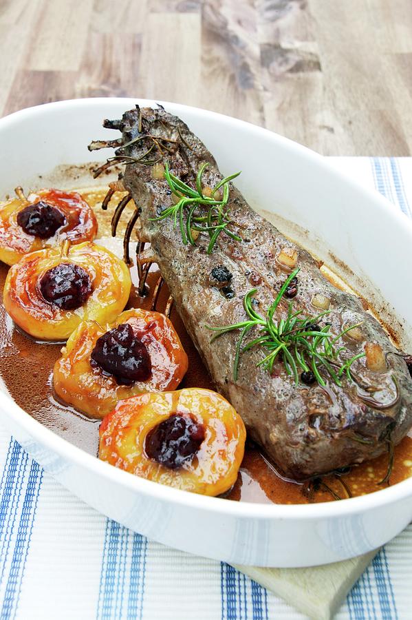 Studded Saddle Of Hare With Cranberry Apples Photograph by Food Experts Group