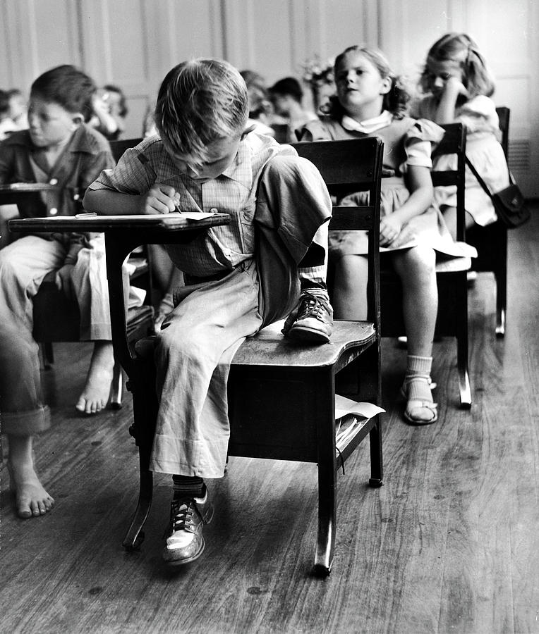 Black And White Photograph - Students At Their Desks by J.R. Eyerman