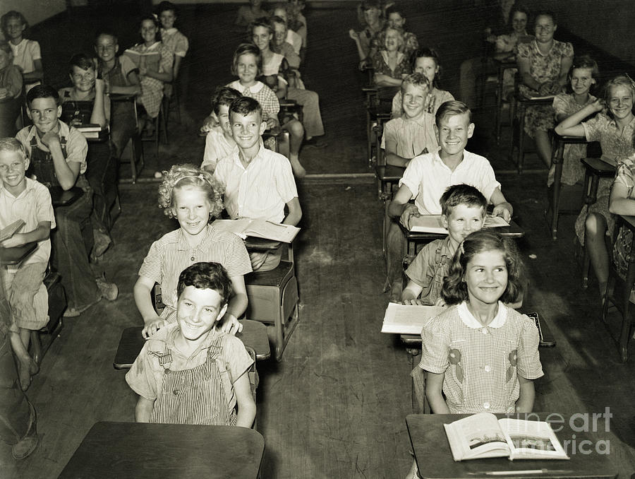 Students Seated In A Classroom Photograph by Bettmann