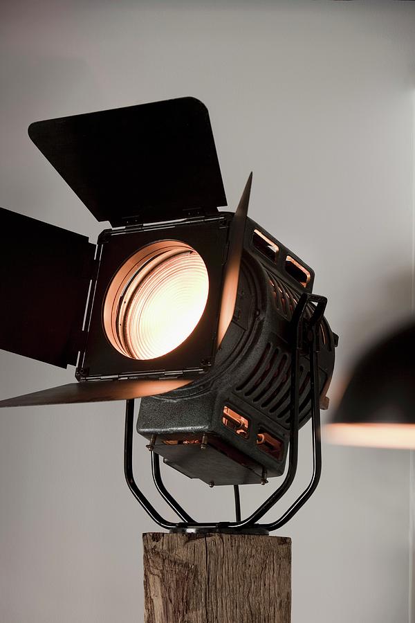 Studio Light Mounted On Wooden Post Photograph by Peter Kooijman
