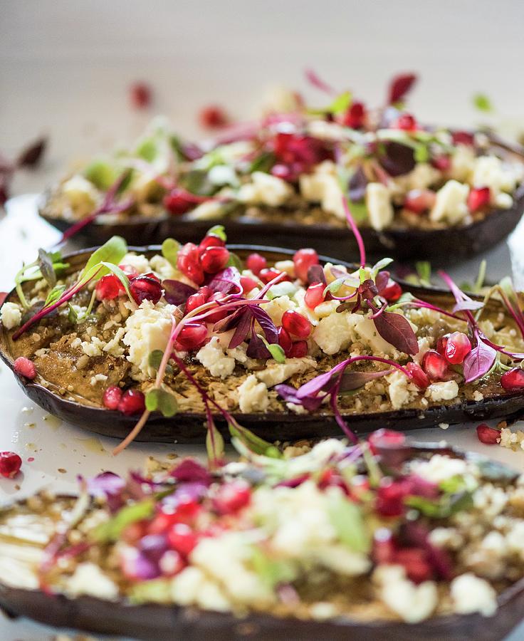 Stuffed Aubergines With Feta Cheese And Pomegranate Seeds Photograph by Hein Van Tonder