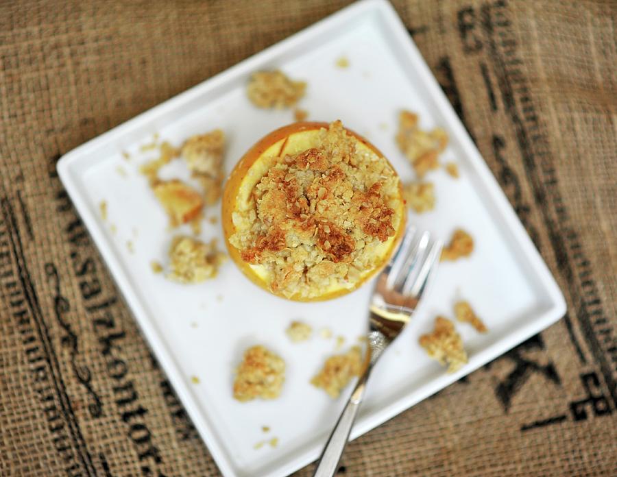 Stuffed Baked Apple With Crumbles seen From Above Photograph by Alexandra Feitsch