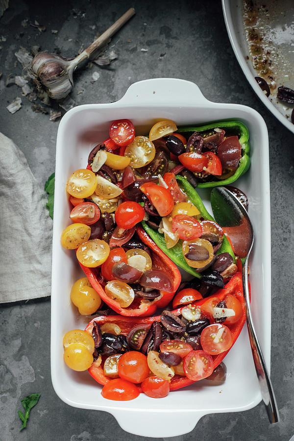 Stuffed Paprika With Tomatoes, Garlic And Olives Photograph by Kate Prihodko