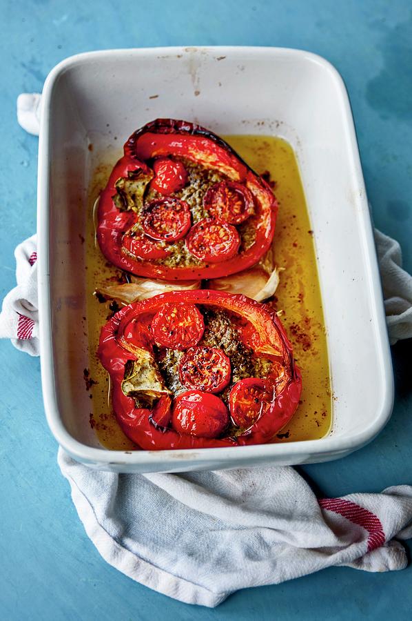 Stuffed Peppers With Cherry Tomatoes, Anchovies And Garlic Photograph by Roger Stowell