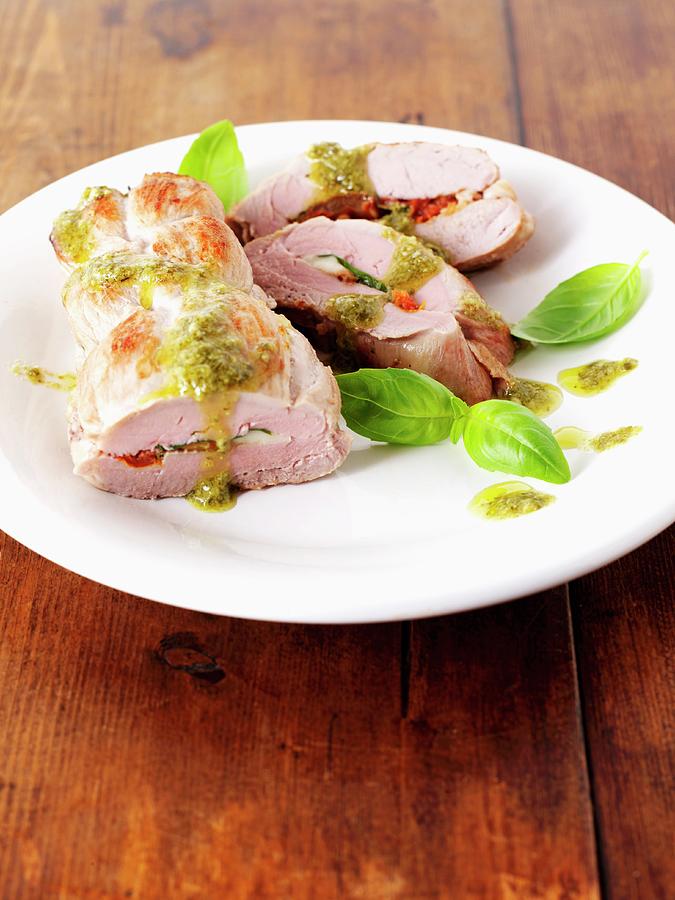 Stuffed Pork Fillet With Basil, Tomatoes, Mozzarella And Pesto Photograph by Frank Adam