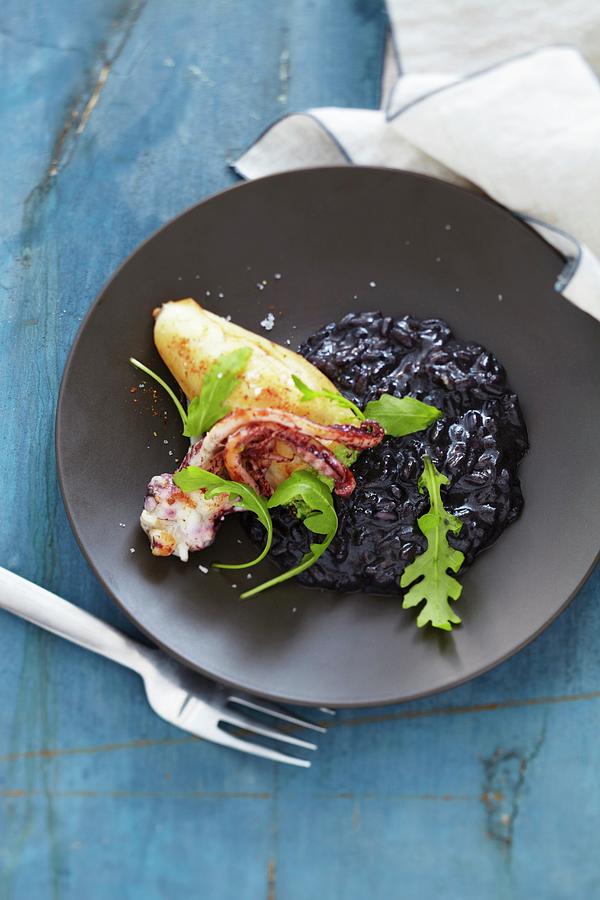 Stuffed Squid On A Bed Of Black Risotto Photograph by Atelier Mai 98