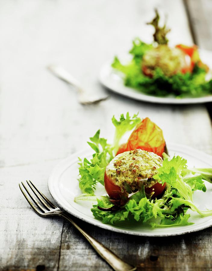 Stuffed Tomatoes On Lettuce Photograph by Mikkel Adsbl