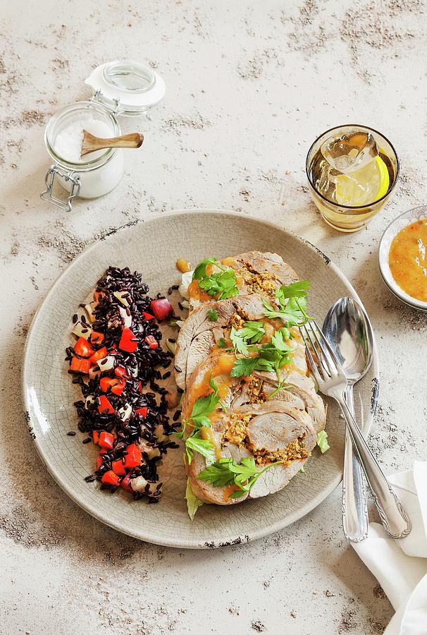 Stuffed Turkey Roulade With A Side Of Black Rice Photograph by Birgit Twellmann