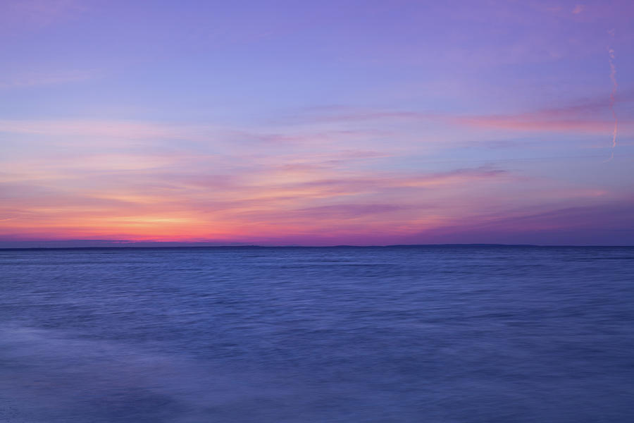 Stunning sunset on the empty beach, Cape Cod, USA Photograph by Radomir ...