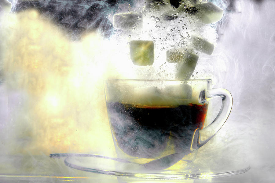 Sugar Cubes Falling Into A Cup Of Coffee underwater Photograph by Kaktusfactory