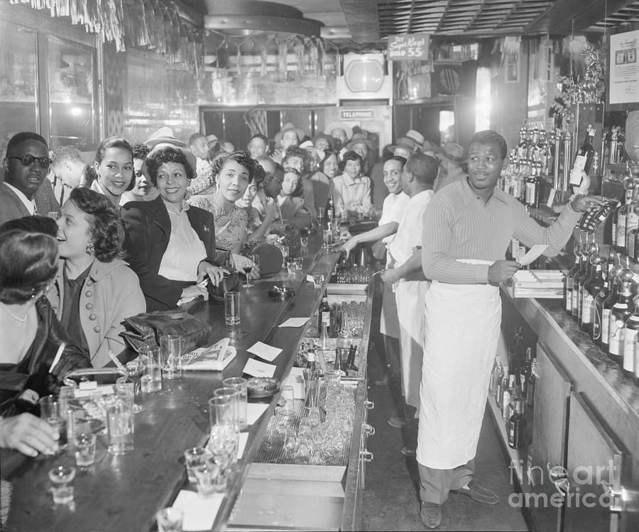 Sugar Ray Robinson Tending Bar Photograph by Bettmann