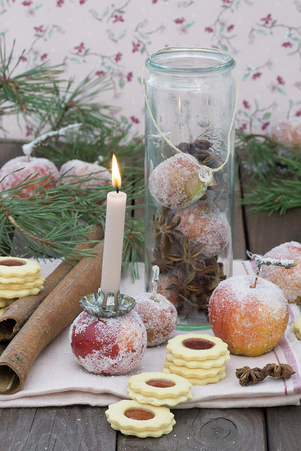 Sugared Apples With Candles And Jam Biscuits Photograph by Martina Schindler