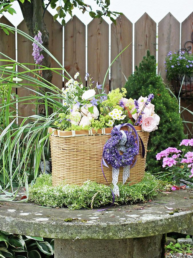 Summer Bouquet Of Roses, Grasses And Lavender In Basket In Wreath Of Lavender Photograph by Susan Haag