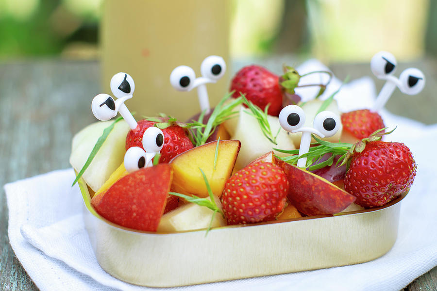 Summer Fruit And Berry Salad In A Jar With Funny Cartoon Eyes Picks Photograph by Andrey Maslakov