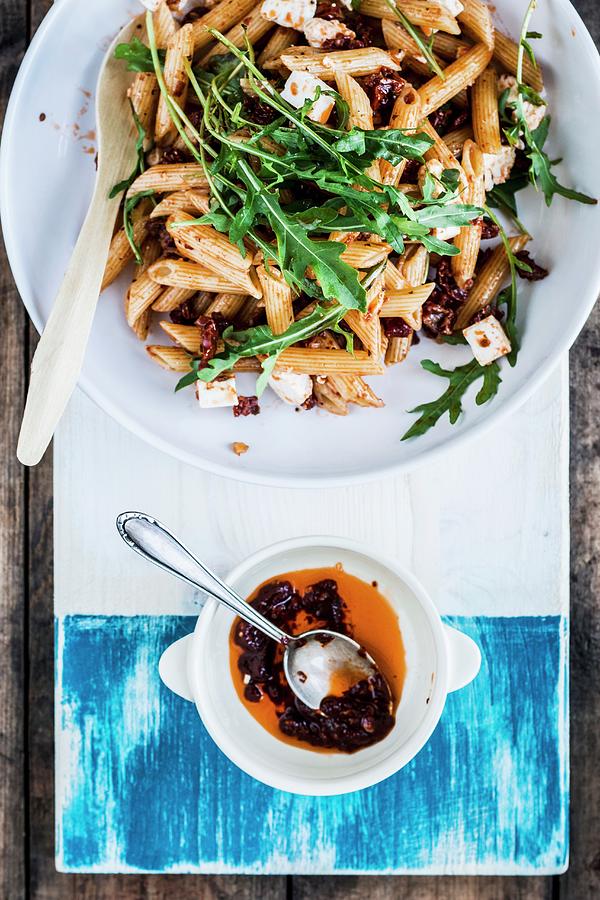 Summer Pasta Salad With Dried Tomatoes, Feta Cheese And Rocket Photograph by Simone Neufing