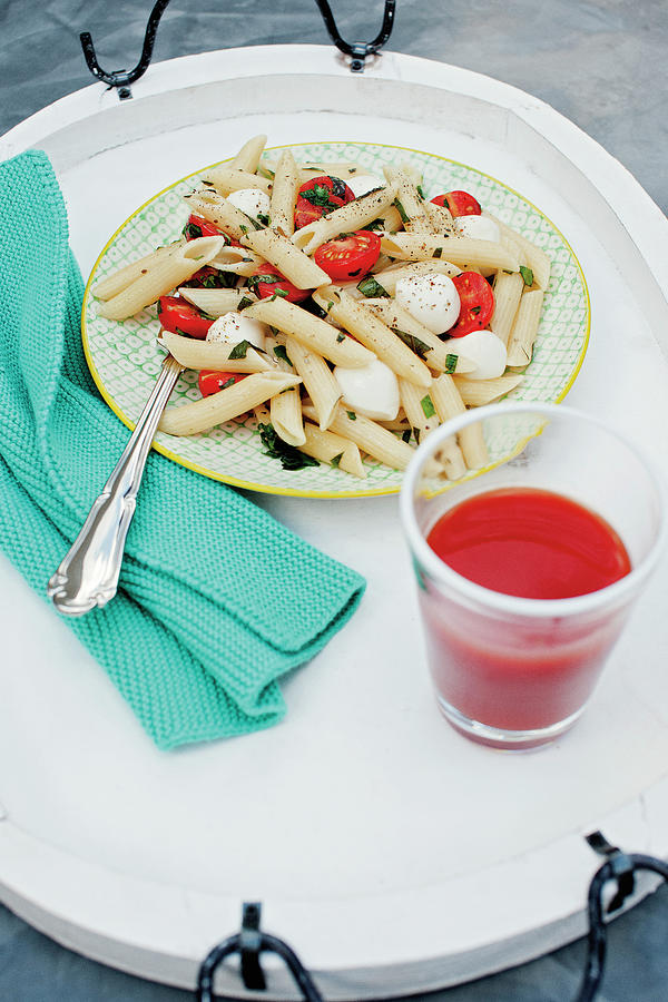 Summer Pasta With Tomatoes, Mini Mozzarella And Basil Photograph by Tre Torri