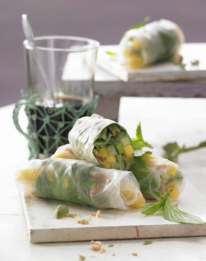 Summer Rolls Filled With Mango, Cucumber And Wasabi Nuts Photograph by Jan-peter Westermann